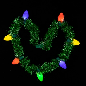 Detailed view of heart-shaped Christmas necklace with colorful glowing LED bulbs