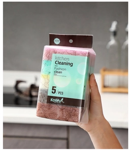 Close-up of hand holding colorful floral pattern kitchen cleaning sponges in 5-piece pack