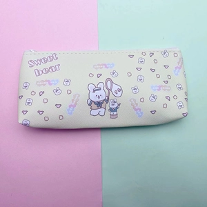 Close-up of beige PU leather pencil case featuring a cute cartoon bear and Sweet Bear text