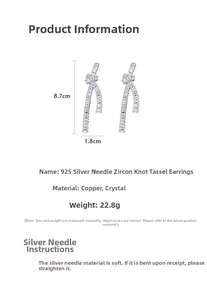 Detail view of 8.7cm long zircon knot tassel earrings with 925 silver needles