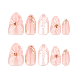3D floral press-on nails with pearl pink finish and golden accents in short almond shape