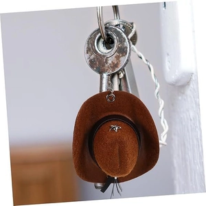 Miniature brown felt cowboy hat keychain with metallic star detail and black lanyard accents