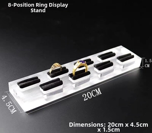 Clear acrylic ring display stand with 8 black velvet slots measuring 20cm x 4.5cm