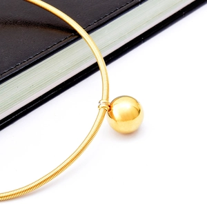 Polished gold metal sphere pendant on a spiral snake chain choker necklace for women
