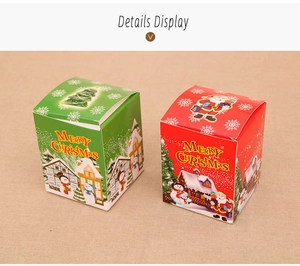 Détail des boîtes cadeaux de Noël rouges et vertes avec des motifs de fête saisonniers