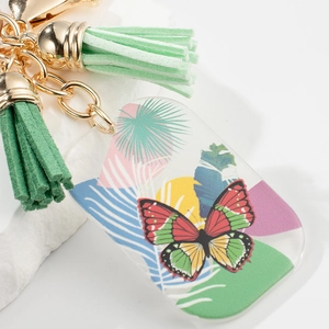 Hawaiian butterfly and tropical leaf acrylic keychain with green tassel and gold ring