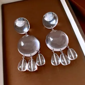 Minimalist transparent resin drop earrings with circular dangles and silver links
