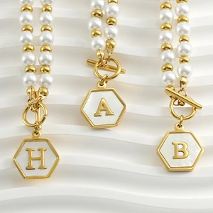 Elegant 18K gold plated double-row pearl chain necklace with hexagonal letter pendants