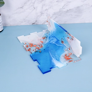 Detail of slot-in resin storage organizer with blue-white gradient and gold foil flakes
