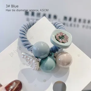 Blue elastic hair tie with floral beads and pearl triangle pendant, 4.5cm diameter
