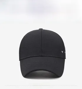 Detail view of the black baseball cap with white Classic script embroidery on the side