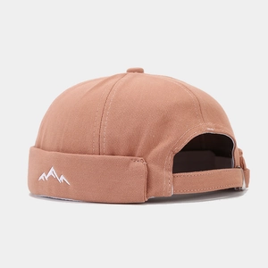 Detail view of cotton miki hat with mountain embroidery and adjustable back strap