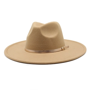 Detailed close-up of a camel wool fedora hat featuring a slim gold metallic belt buckle strap
