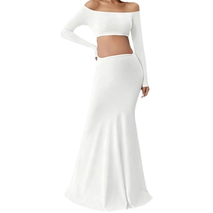White two-piece maternity set featuring off-shoulder long sleeve crop top and mermaid skirt