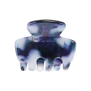 Detailed view of mini acetate hair claw clip with blue and white marble texture pattern