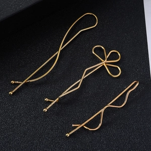 Three-piece set of elegant gold-plated alloy hair clips with minimalist chic metal finish