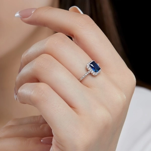 Elegant S925 sterling silver ring with a rectangular blue gemstone and sparkling zircon