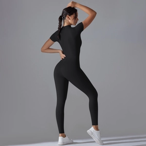 Back view of a high-elastic black short-sleeve athletic jumpsuit for yoga and fitness