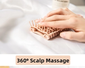 Macro shot of flexible pink silicone hair massage brush with 360-degree deformation