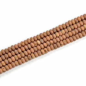 Macro shot of 5x8mm brown geodes agate rondelle beads for DIY jewelry making
