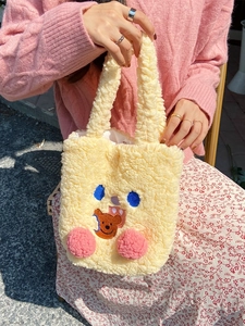 Cute yellow plush tote bag with cartoon bear embroidery and pink pom-pom charms
