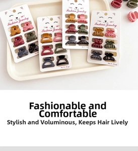Flat lay of colorful mini hair claws in matte finish including bow and hollow designs