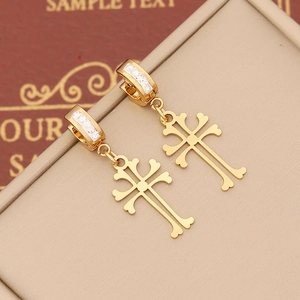 Gold plated cross drop earrings with cubic zirconia inlay on polished huggie hoops