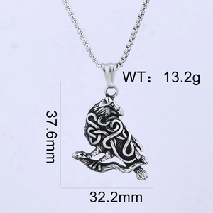 Detailed macro view of vintage stainless steel raven pendant with Celtic knot patterns