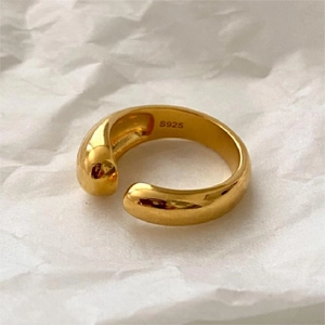 Detailed close-up of S925 hallmark on minimalist sterling silver teardrop ring