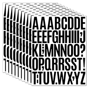 Stack of waterproof 2-inch vinyl alphabet and number stickers with bold black letters