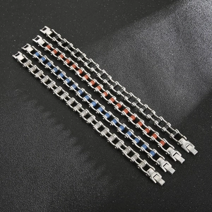 Detail of slim industrial bicycle chain bracelets for men in four metallic color finishes