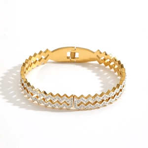 Elegant gold-plated wave-shaped titanium steel bracelet with sparkling white rhinestones