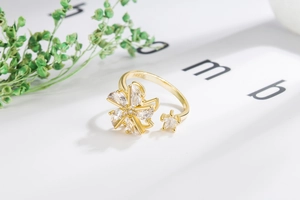Macro shot of S925 sterling silver spinning flower ring with sparkling zircon stones