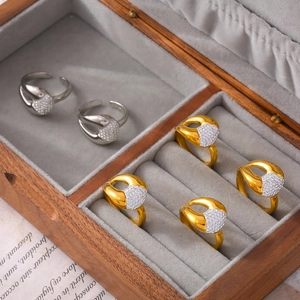 Set of irregular geometric gold and silver 18k plated steel rings with pavé rhinestones