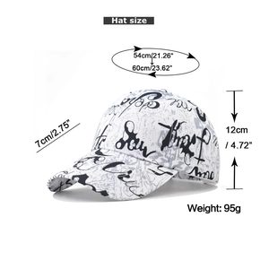 Detail view of cotton baseball cap with artistic graffiti prints and size specifications