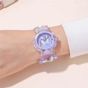Detail of purple unicorn kids watch with luminous LED lights and transparent case