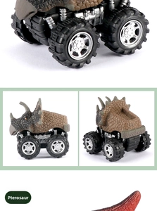 Detailed close-up of brown Pterosaur monster truck toy with large grip tires