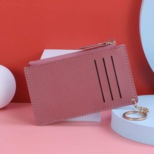 Slim pink faux leather card holder wallet with multiple slots and gold zipper key ring
