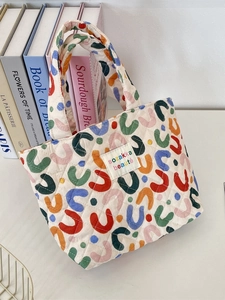 Sac fourre-tout matelassé avec motifs en U colorés et poignée rembourrée pour femme