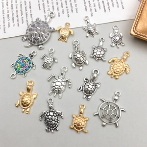 Antique silver and gold sea turtle charms set for DIY jewelry making and craft projects