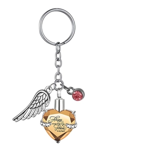 Silver heart urn keychain with amber crystal wing and pink charm for pet memorial gift