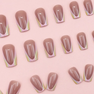 French macaron pastel tipped coffin fake nails in nude tones on pink background