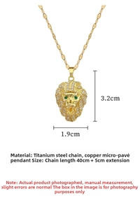Macro view of crystal encrusted lion head pendant with green stone eyes and gold chain