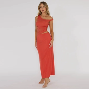 Detail of orange mesh two-piece set featuring a one-shoulder top and maxi column skirt