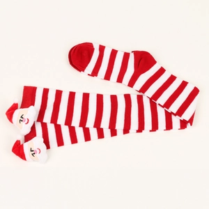 Detail of red and white striped Christmas stockings featuring 3D Santa Claus doll decor