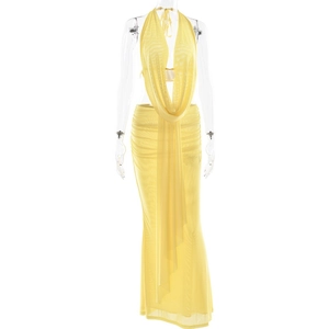 Detail of yellow halter neck cowl top and maxi skirt set with sheer mesh texture on mannequin