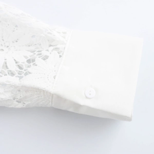 Romantic white lace sleeve blouse with floral patterns and minimalist button cuffs