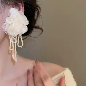 Elegant off-white chiffon flower earrings with long bead tassels and crystal droplets