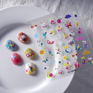5D embossed nail stickers featuring colorful butterflies and flowers on manicured nails