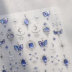 3D embossed blue dream nail stickers featuring butterfly moon and star magical designs